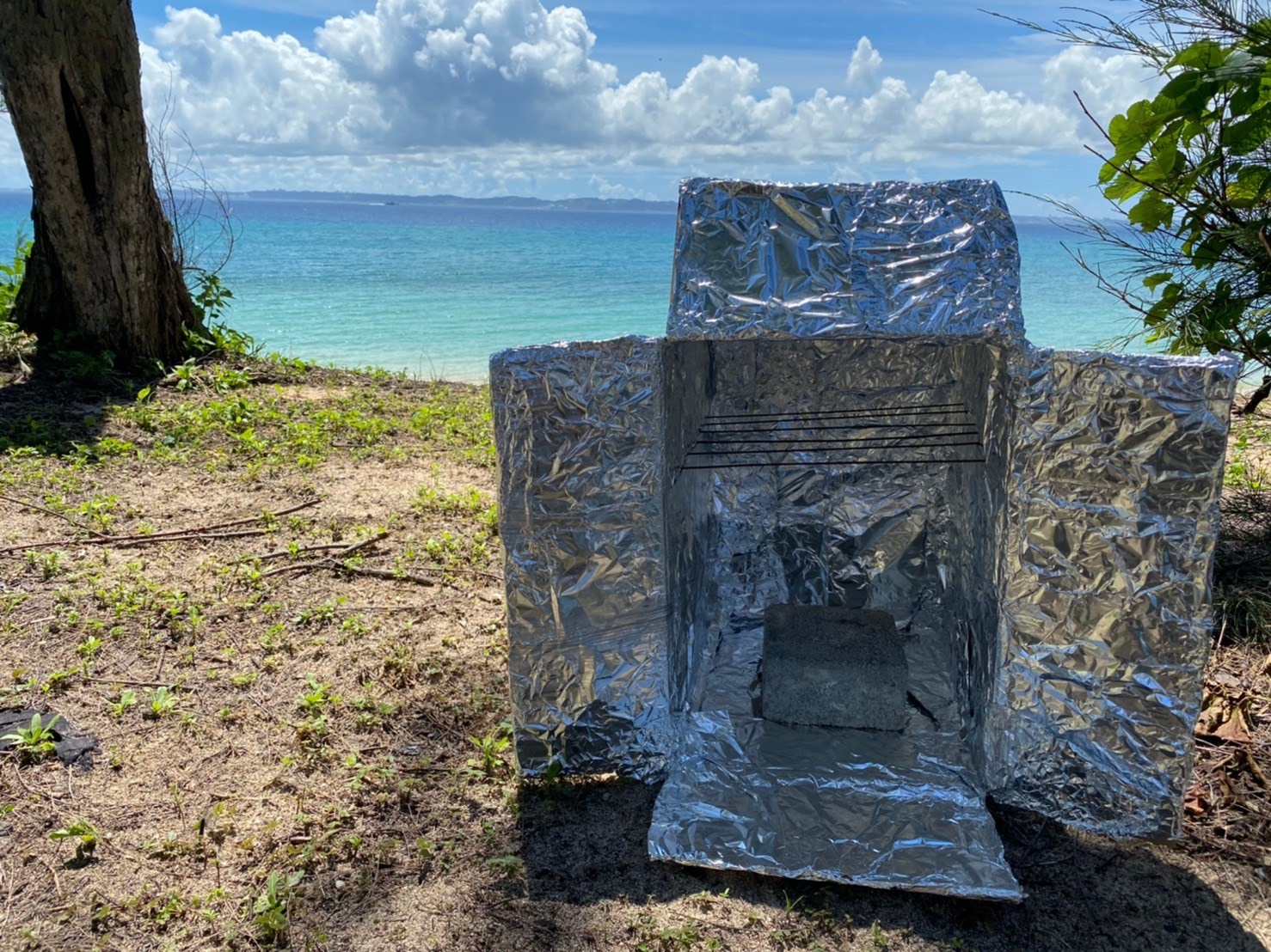 【うるま】穴場な離島でキャンプ⛺
～釣った魚をダンボールオーブンで料理～＜キャンプ道具・釣り道具込み＞ / ダンボールオーブンで作る！ おふのピザ🍕＆釣った魚のバター焼き🐟