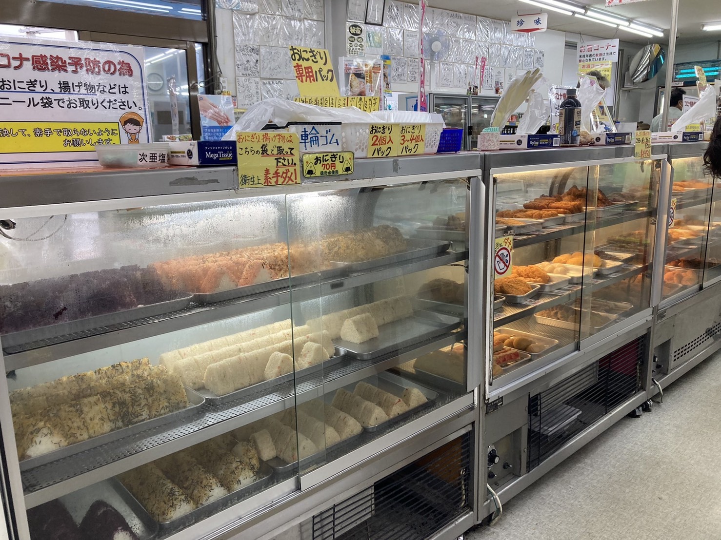 Buying Ishigaki's local food at a neighborhood shop